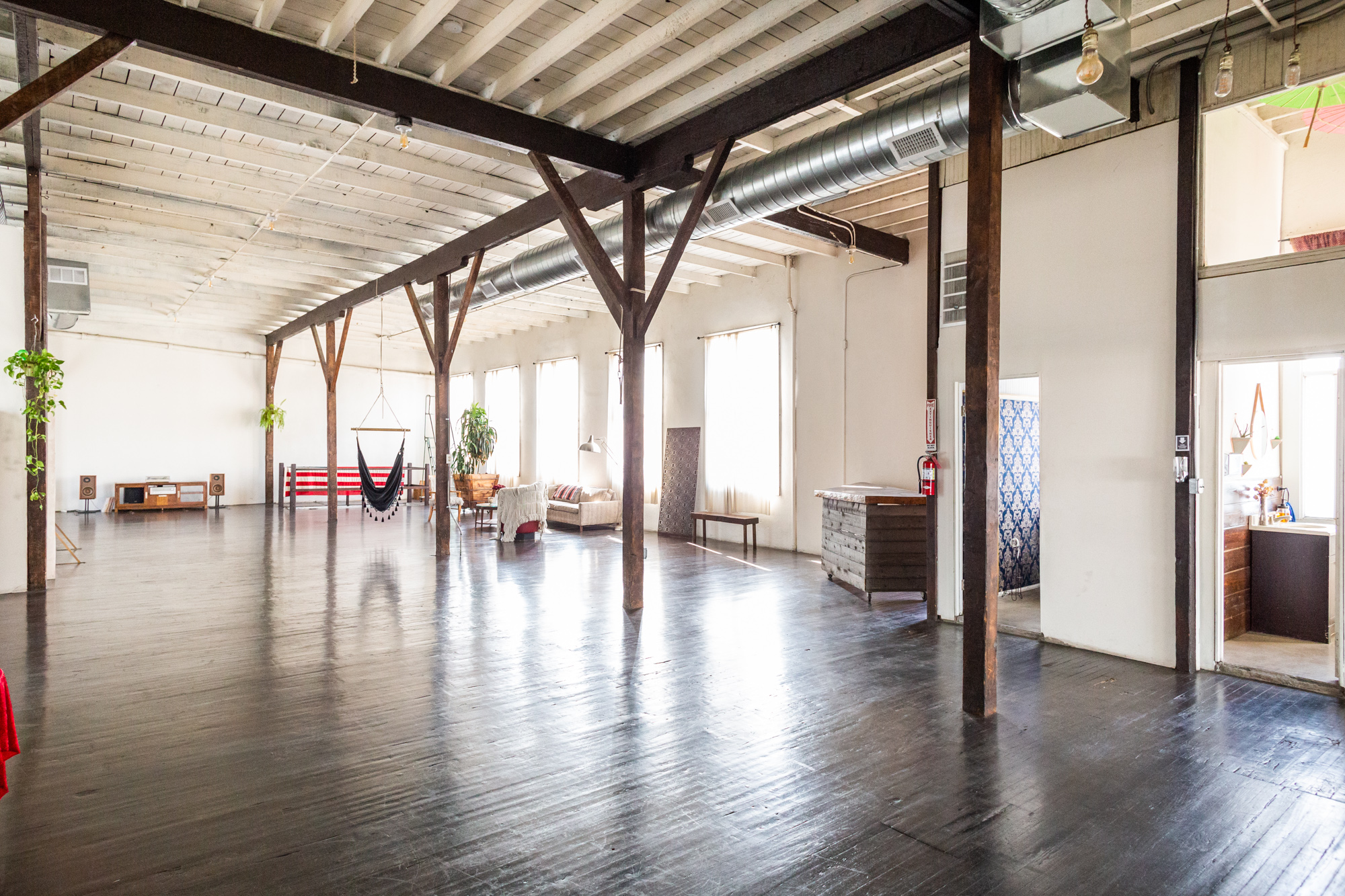Warm wood interior — Rosewolff Studio intimate side